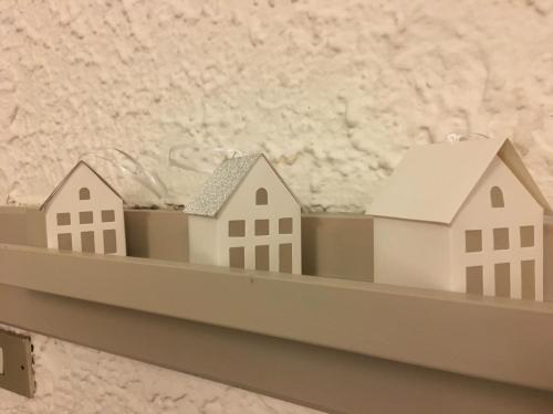 a model of houses on a wall at B&B Il Piccolo Principe room and breakfast in Bieno