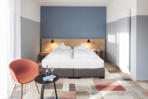 Ένα ή περισσότερα κρεβάτια σε δωμάτιο στο Hotel Schwanen
