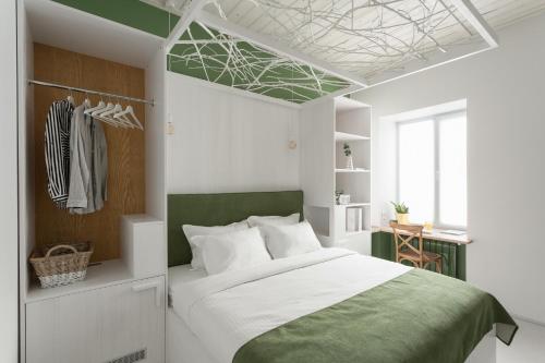 Кровать или кровати в номере City Hotel Bortoli by Ribas
