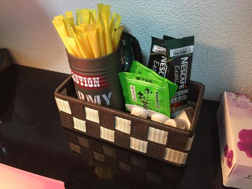 a basket of fries and chips on a table at Kenroku Haitsu 101 in Kanazawa