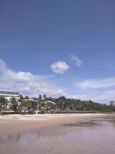 a view of a beach with houses and trees at The Cliff Residence in Mui Ne