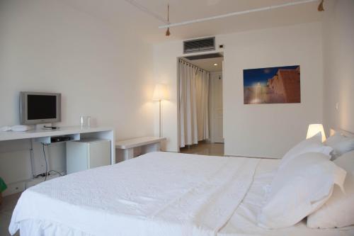 Port Alacati Hotelにあるベッド