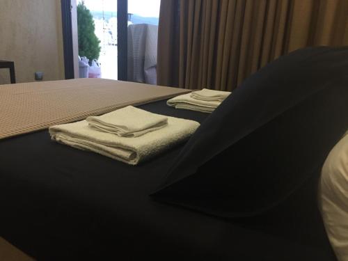 Stylish Seaview Rooftopにあるベッド