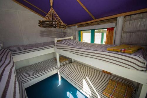 Ένα ή περισσότερα κρεβάτια σε δωμάτιο στο Hostel Albatros