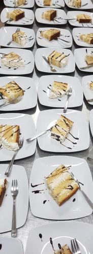 a bunch of plates of food on a table at Hotel Mariagrazia in Calopezzati