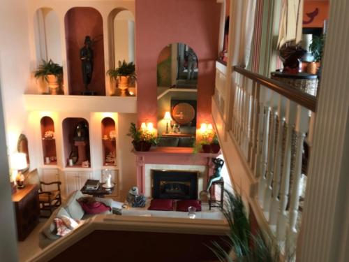 a view of a living room with a fireplace at Mermaid's Muse Bed and Breakfast in Brookings