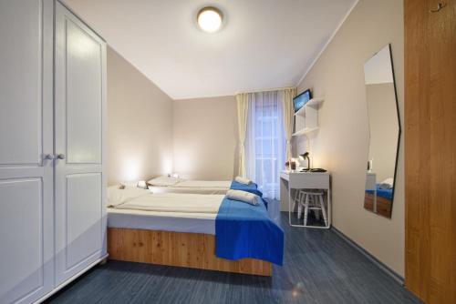 Katil atau katil-katil dalam bilik di Hotel Nowa Panorama