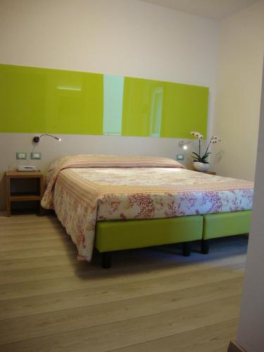 Postel nebo postele na pokoji v ubytování Hotel Venezia