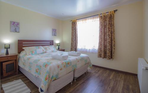 
Кровать или кровати в номере Apartamentos Entre Fronteras

