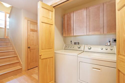 a laundry room with a washer and dryer at North Shore - Golden Pine in Kings Beach