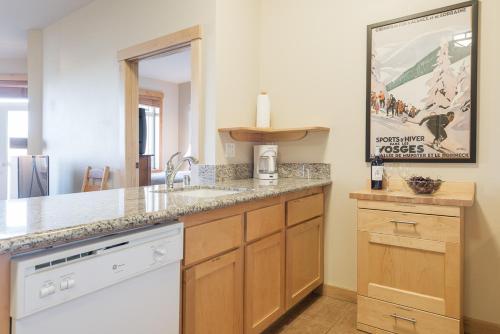 a kitchen with a sink and a counter top at Sunstone 325 in Old Mammoth