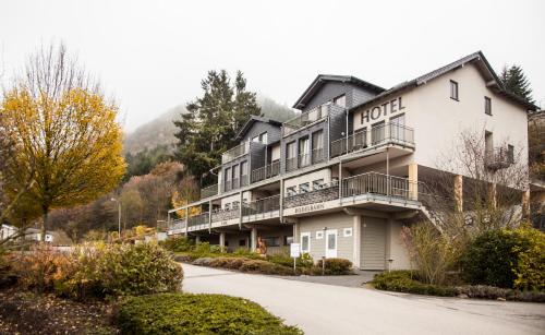 a hotel on the side of a mountain at M13 Hotel in Riol