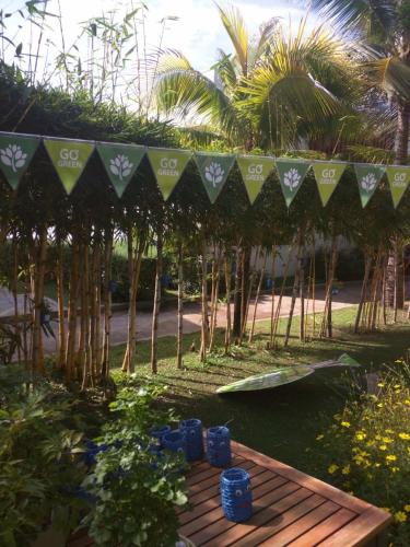a picnic table with a party banner over it at The Cliff Residence in Mui Ne
