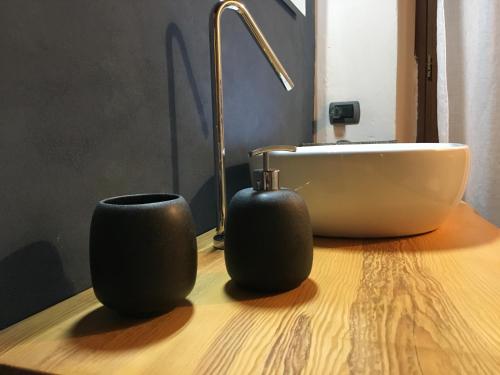 a bathroom with a sink and a sink at Baita Sorriso in Brunate