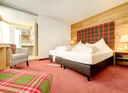 Alpenresort Walsertalにあるベッド