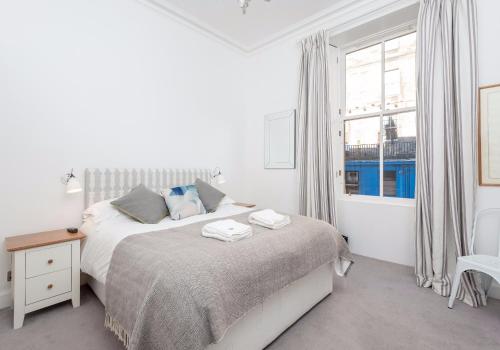 Ένα ή περισσότερα κρεβάτια σε δωμάτιο στο West Bow just off Royal Mile