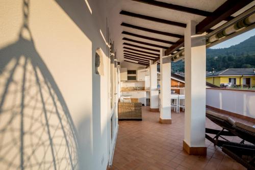 a shadow of a person on a balcony at Rooftop Apartment in Garda
