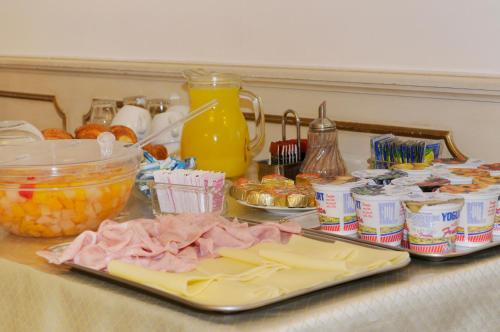 a counter top with a bunch of food and ingredients at Hotel Il Mercante di Venezia in Venice