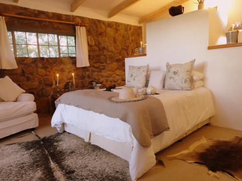 Кровать или кровати в номере Amohela ho Spitskop Country Retreat & Conservancy
