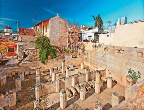 a view of a city with buildings in the background at Megara Hotel in Megara