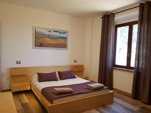 Tempat tidur dalam kamar di La Collina