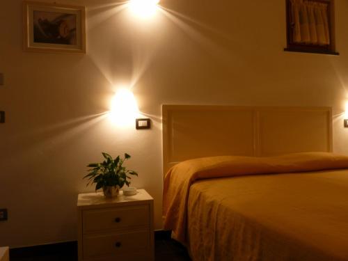 Una cama o camas en una habitación de La Gerbera