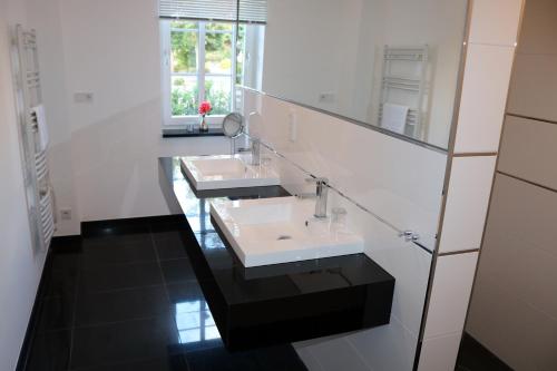 Un baño de Kurhaus Design Boutique Hotel