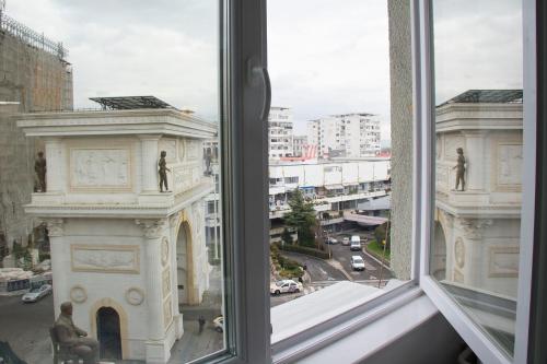 a view from an open window of a building at Skopje Arch Residence in Skopje