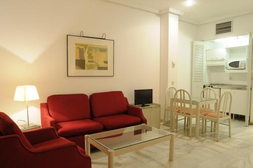 Kuchyň nebo kuchyňský kout v ubytování Hospedium Hotel Apartamentos Simón Verde
