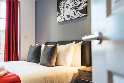 A bed or beds in a room at The Stay Company, Friar Gate