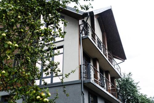 a building with balconies on the side of it at Girske Povitria 2 in Yaremche
