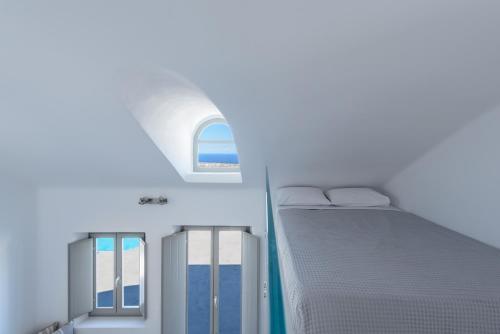 Кровать или кровати в номере Sandy & Salty Villas