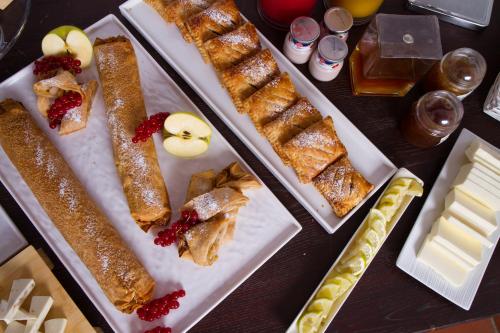 a table with two trays of food on it at Cincinnato Wine Resort in Cori