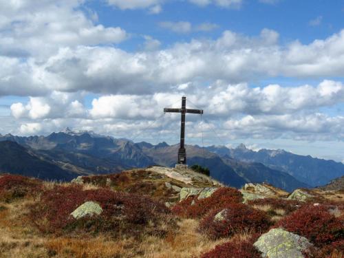 a cross on the top of a mountain at Haus Klinger in Gaschurn