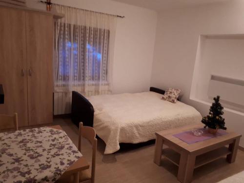 Apartments Popovicにあるベッド