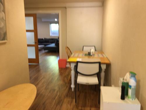 a room with a table and chairs in a room at Like Home but Better! A Boulder Favorite!! in Boulder