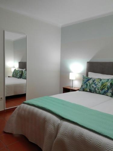 Krevet ili kreveti u jedinici u okviru objekta Hotel Dom Lourenco