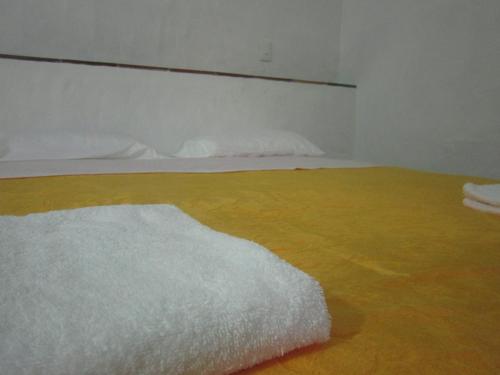 Postel nebo postele na pokoji v ubytování Hotel Central Graciela