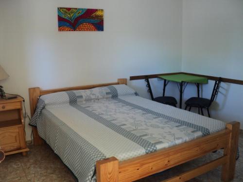 Postel nebo postele na pokoji v ubytování La Nona