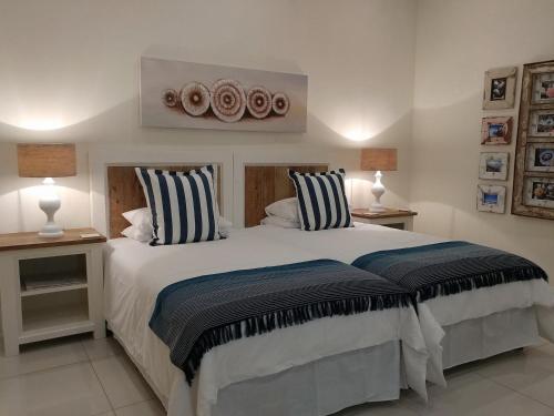 Ένα ή περισσότερα κρεβάτια σε δωμάτιο στο Andante Lodge
