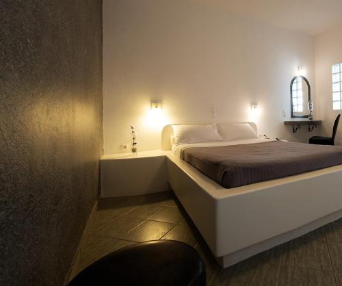 Ein Bett oder Betten in einem Zimmer der Unterkunft Philippion Boutique Hotel