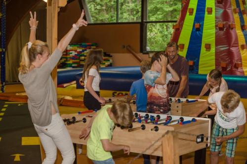 a group of children playing a game of chess at Familienhotel Sonngastein in Bad Gastein