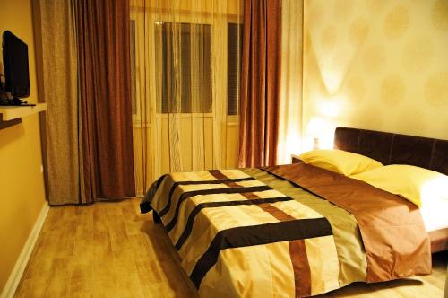 Katil atau katil-katil dalam bilik di Hotel Aqua Panon