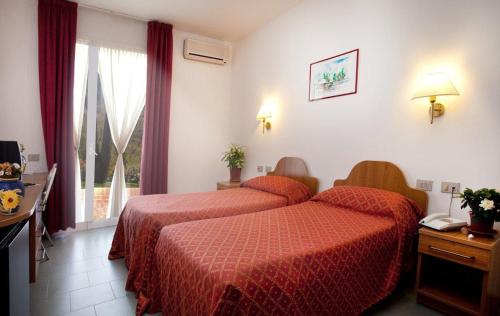 A bed or beds in a room at I Girasoli