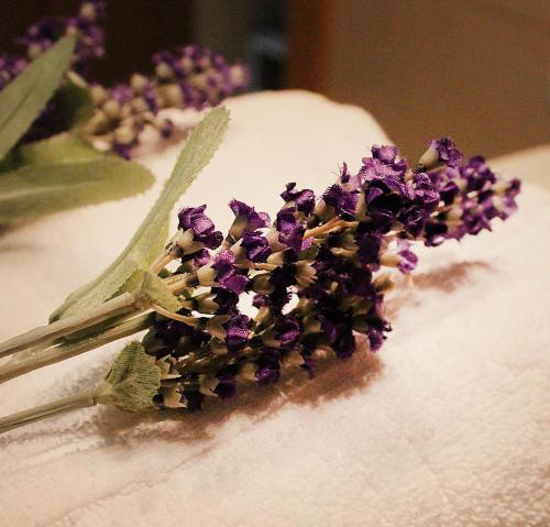 a bunch of purple flowers on top of a cake at Hotel Martin in Međugorje