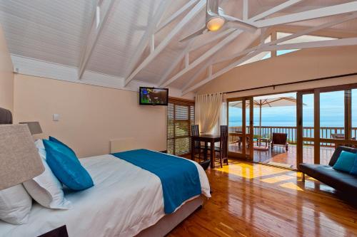 Katil atau katil-katil dalam bilik di Aquamarine Guest House