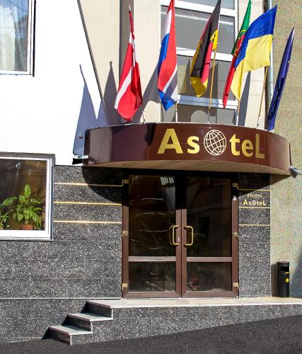 a group of flags on the front of a building at Asotel in Kharkiv