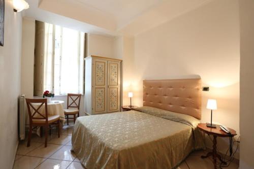 Кровать или кровати в номере Bovio Suite