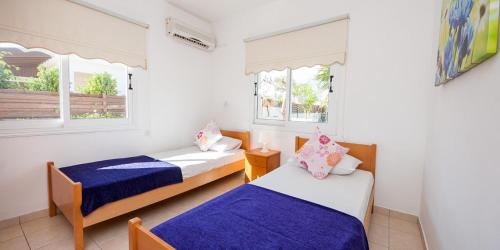 Llit o llits en una habitació de Villa Stefanie