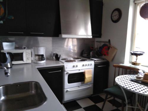 Una cocina o cocineta en Porshøjvej